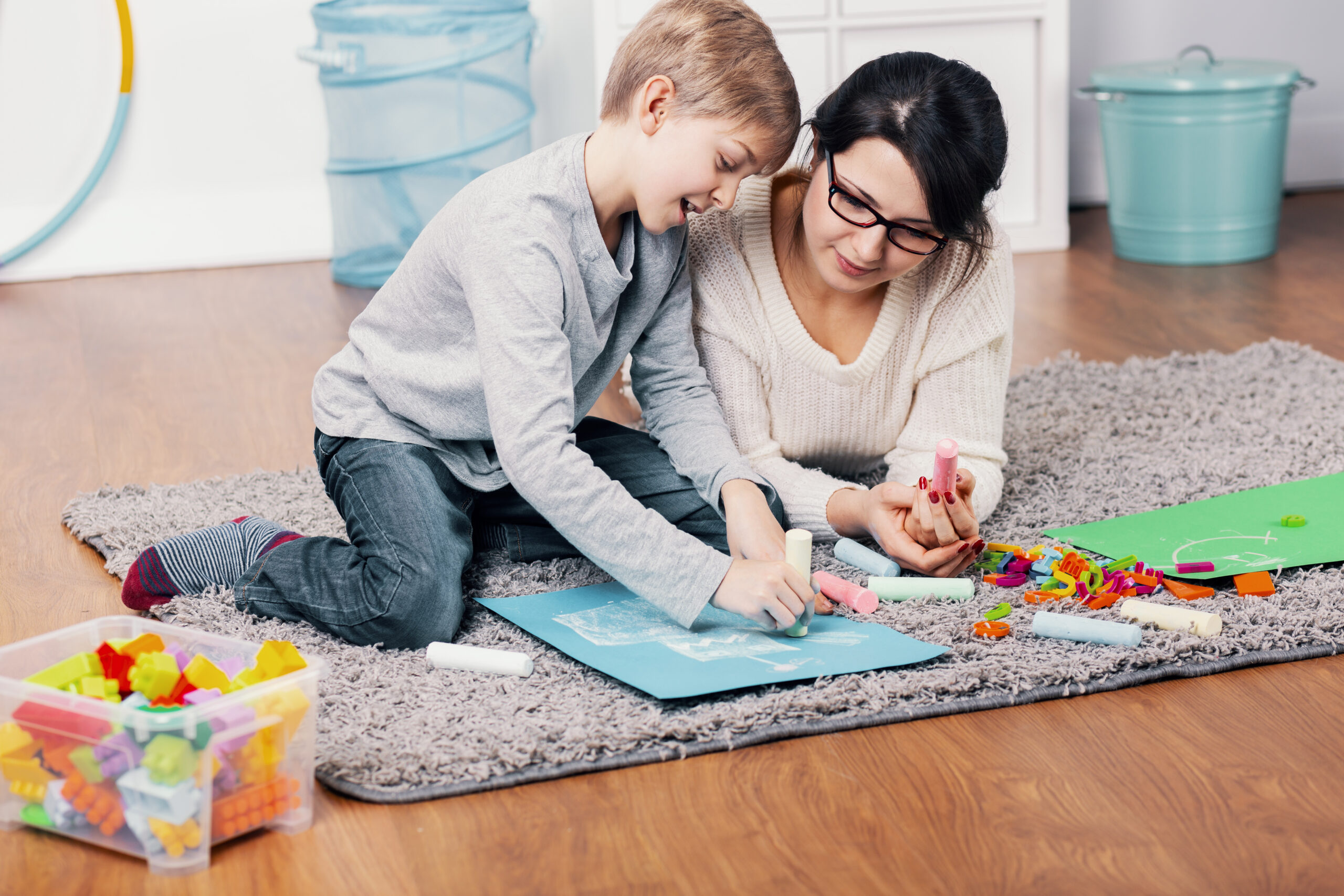 mother and autistic boy drawing a picture on the f 2025 10 02 00 19 25 utc